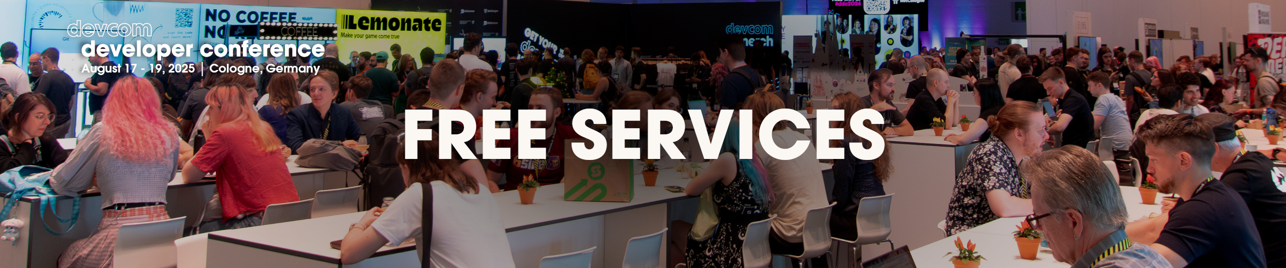 ddc_2025_freeservices_header_rb Page header for the free services page showing people at coffee tables at devcom developer conference