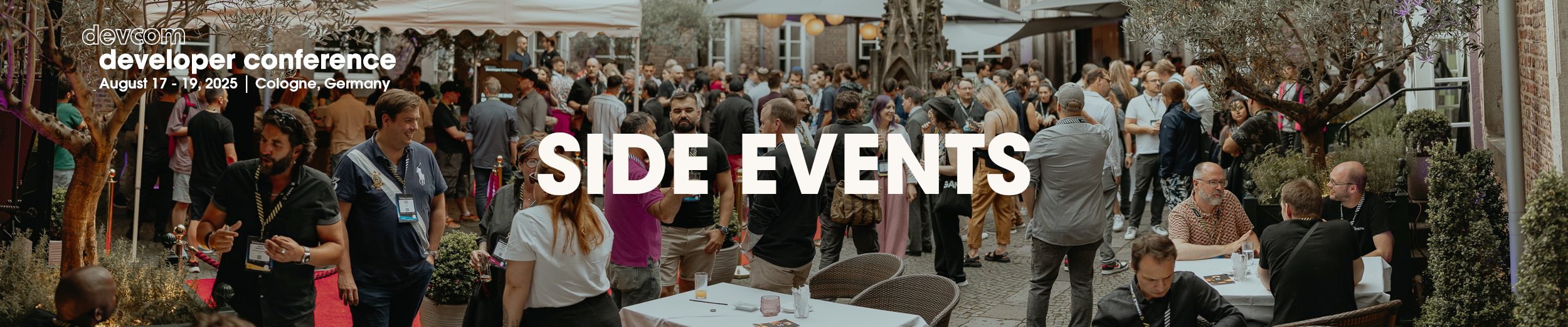 ddc_2025_sideevents_rb Page header for the side events page showing a happy crowd at a devcom party